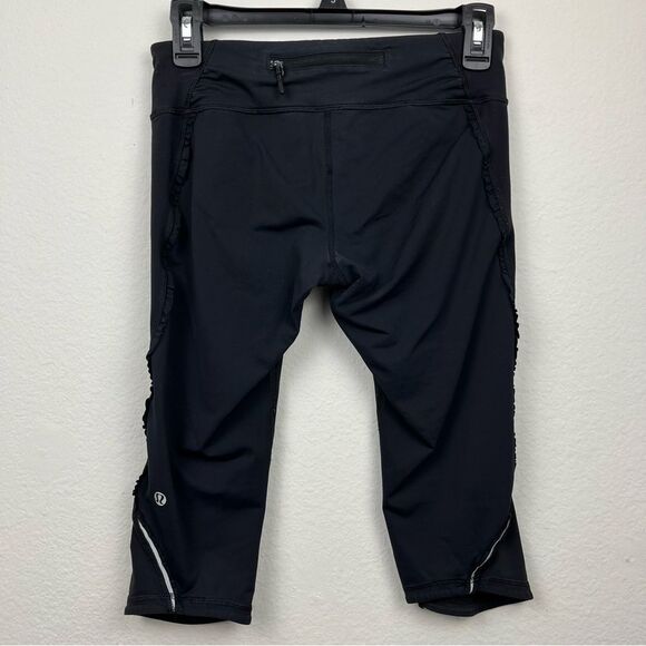 lululemon athletica Black Capri Leggings with Ruffle Detailing on Legs- Size 6 - Picture 1 of 5